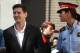 Barcelona F.C. soccer player Lionel Messi, left, arrives at a court to answer questions in a tax fraud case, in Gava, near Barcelona, Spain, Friday, Sept. 27, 2013. Barcelona star Lionel Messi and his father are appearing before a Spanish judge to answer questions in a tax fraud case. A complaint lodged by a Spanish state prosecutor in June said Messi and his father tried to conceal earnings from the player's image rights. The complaint alleged the Argentina international owed 4 million euros ($5.3 million) in back taxes from 2007, 2008 and 2009. (AP Photo/Paco Serinelli)