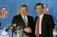 Jerry Richardson, left, is congratulated by NFL commissioner Paul Tagliabue, Oct. 26, 1993 in Rosemont, Ill., after the announcement that an expansion team in Charlotte, N.C, run by Richardson, will be added to the NFL beginning in 1995. (AP Photo/Mark Elias)
