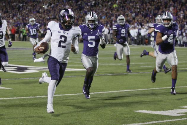 Oct 10, 2015; Manhattan, KS, USA; TCU Horned Frogs quarterback Trevone Boykin (2) runs away from Kansas State Wildcats defensive backs Jesse Mack (5) and Kaleb Prewett (4) for a touchdown during the Horned Frogs' 53-45 win at Bill Snyder Family Football Stadium. Mandatory Credit: Scott Sewell-USA TODAY Sports
