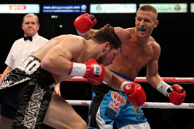 MANCHESTER, ENGLAND - OCTOBER 10:  Terry Flanagan of Great Britain (R) and Diego Magdaleno of the USA exchange blows in their WBO World Lightweight Championship fight at Manchester Arena on October 10, 2015 in Manchester, England.  (Photo by Ben Hoskins/Getty Images)