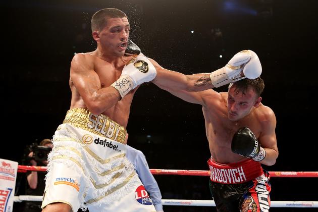 LONDON, ENGLAND - MAY 30:  Evgeny Gradovich of Russia lands a punch on Lee Selby of Wales during the IBF Featherweight World Championship bout at The O2 Arena on May 30, 2015 in London, England.  (Photo by Ben Hoskins/Getty Images)