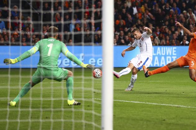 Pavel Kaderabek of the Czech Republic, center, scores his side’s first goal passing Netherlands' goalkeeper Jeroen Zoet, left, and Netherlands' Jairo Riedewald, right, during the Euro 2016 qualifying match between the Netherlands and the Czech Republic, at the ArenA stadium, in Amsterdam, Netherlands, Tuesday, Oct. 13, 2015. (AP Photo/Peter Dejong)