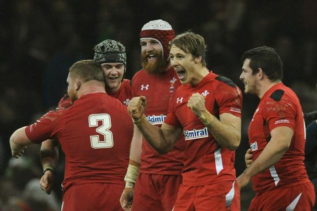 Wales' Liam Williams, 2nd right, celebrates with Jack Ball, 3rd right, after Wales beat South Africa 12-6 during the International Rugby Union match between Wales and South Africa at the Millennium Stadium, Cardiff, Wales, Saturday, Nov. 29, 2014. (AP Photo/Rui Vieira)