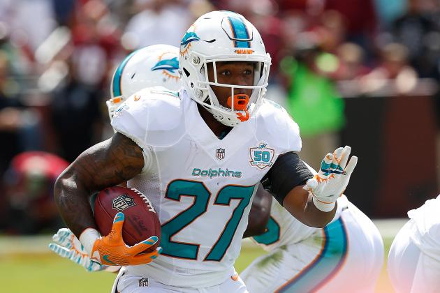 Sep 13, 2015; Landover, MD, USA; Miami Dolphins running back LaMichael James (27) carries the ball against the Washington Redskins at FedEx Field. Mandatory Credit: Geoff Burke-USA TODAY Sports