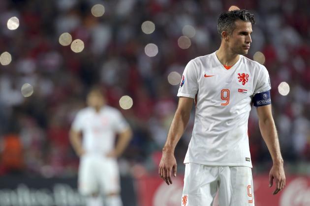 Robin Van Persie of the Netherlands reacts after they lost 3-0 to Turkey during their Euro 2016 Group A qualifying soccer match at the Buyuksehir Torku Arena Stadium in Konya, Turkey, Sunday, Sept. 6, 2015. (AP Photo)
