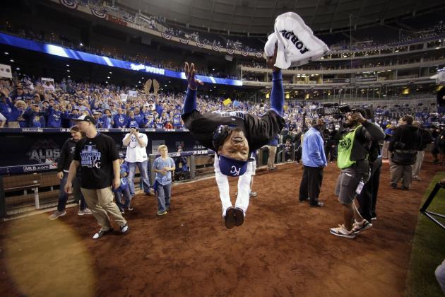 Kansas City Royals center fielder Jarrod Dyson does a backflip on the field as he celebrates his team's 7-2 win over the Houston Astros in Game 5 of baseball's American League Division Series, Wednesday, Oct. 14, 2015, in Kansas City, Mo. (AP Photo/Charlie Riedel)