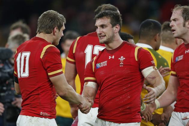Wales' captain Sam Warburton, right, shakes hands with Dan Biggar after the Rugby World Cup Pool A match between Australia and Wales at Twickenham stadium in London, Saturday, Oct. 10, 2015. Australia won the match 15-6. (AP Photo/Alastair Grant)