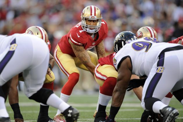 San Francisco 49ers quarterback Colin Kaepernick prepares to run a play in the first half of an NFL preseason football game against the Baltimore Ravens, Thursday, Aug. 7, 2014, in Baltimore. (AP Photo/Nick Wass)