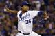 Kansas City Royals starting pitcher Edinson Volquez throws against the Toronto Blue Jays during the first inning in Game 1 of baseball's American League Championship Series, Friday, Oct. 16, 2015, in Kansas City, Mo. (AP Photo/Matt Slocum)