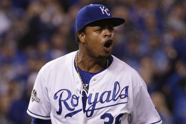 Kansas City Royals starting pitcher Edinson Volquez celebrates after the last out in the top of the sixth inning against the Toronto Blue Jays in Game 1 of baseball's American League Championship Series on Friday, Oct. 16, 2015, in Kansas City, Mo. (AP Photo/Charlie Riedel)