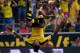 Dortmund's Gabonese striker Pierre-Emerick Aubameyang makes a jump after scoring during the German first division Bundesliga football match Borussia Dortmund vs Hertha BSC in Dortmund, Germany, on August 30, 2015. AFP PHOTO / PATRIK STOLLARZ
RESTRICTIONS: DURING MATCH TIME: DFL RULES TO LIMIT THE ONLINE USAGE TO 15 PICTURES PER MATCH AND FORBID IMAGE SEQUENCES TO SIMULATE VIDEO.
== RESTRICTED TO EDITORIAL USE ==
FOR FURTHER QUERIES PLEASE CONTACT DFL DIRECTLY AT + 49 69 650050. (Photo credit should read PATRIK STOLLARZ/AFP/Getty Images)