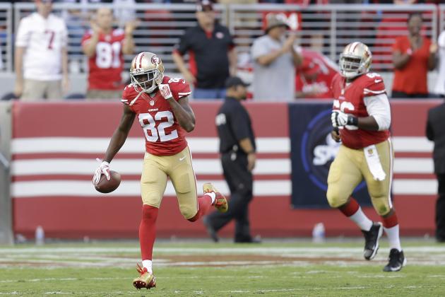 San Francisco 49ers wide receiver Torrey Smith (82) celebrates after scoring on a 76-yard touchdown reception against the Baltimore Ravens during the first half of an NFL football game in Santa Clara, Calif., Sunday, Oct. 18, 2015. (AP Photo/Ben Margot)