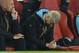 Arsenal's French manager Arsene Wenger (R) and assistant manager Steve Bould (L) reacts as they watch the action from the dug out during the UEFA Champions League Group F football match between Arsenal and Olympiakos at The Emirates Stadium in north London on September 29, 2015. AFP PHOTO / GLYN KIRK (Photo credit should read GLYN KIRK/AFP/Getty Images)