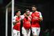 WATFORD, ENGLAND - OCTOBER 17: Aaron Ramsey of Arsenal (C) celebrates with Hector Bellerin (L) and Olivier Giroud (R) as he scores their third goal during the Barclays Premier League match between Watford and Arsenal at Vicarage Road on October 17, 2015 in Watford, England. (Photo by Jan Kruger/Getty Images)