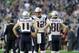 New England Patriots' Tom Brady (12) talks to Julian Edelman (11) and Danny Amendola (80) before the NFL Super Bowl XLIX football game Sunday, Feb. 1, 2015, in Glendale, Ariz. (AP Photo/Patrick Semansky)