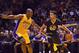 Oct 17, 2015; San Diego, CA, USA; Golden State Warriors guard Stephen Curry (30) is defended by Los Angeles Lakers forward Metta World Peace (37) during the third quarter at Valley View Casino Center. Mandatory Credit: Jake Roth-USA TODAY Sports