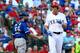 ARLINGTON, TX - OCTOBER 12: Drew Stubbs #15 of the Texas Rangers strikes out in the eighth inning against the Toronto Blue Jays in game four of the American League Division Series at Globe Life Park in Arlington on October 12, 2015 in Arlington, Texas. (Photo by Ronald Martinez/Getty Images)