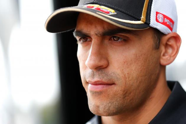 MONZA, ITALY - SEPTEMBER 03: Pastor Maldonado of Venezuela and Lotus speaks with members of the media in the paddock during previews to the Formula One Grand Prix of Italy at Autodromo di Monza on September 3, 2015 in Monza, Italy. (Photo by Charles Coates/Getty Images)