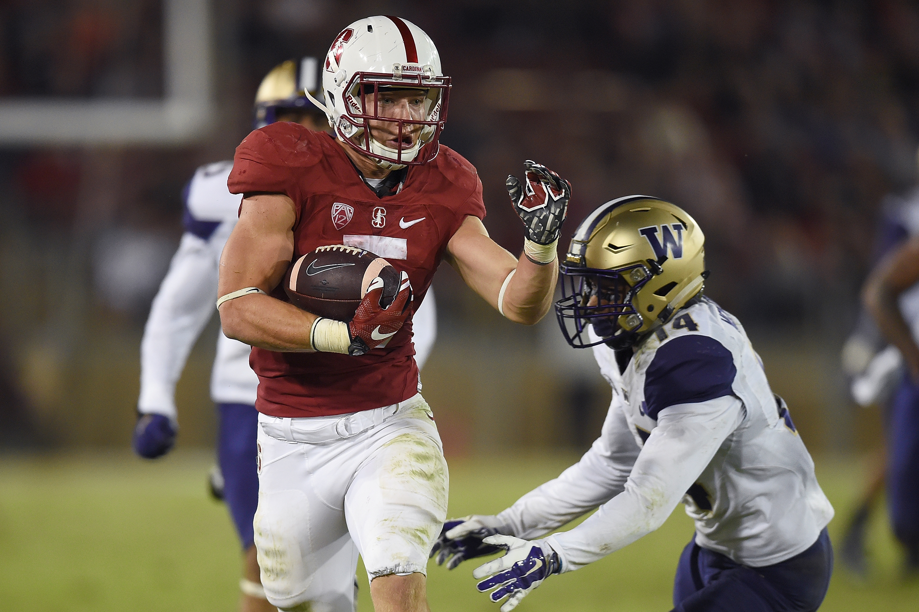 Christian McCaffrey Stanford Cardinal Unsigned Black Jersey Diving for  Catch vs. Washington State Photograph