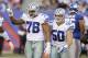 Dallas Cowboys defensive end Greg Hardy (76) and Sean Lee (50) celebrate after Hardy sacked New York Giants quarterback Eli Manning during the first half of an NFL football game Sunday, Oct. 25, 2015, in East Rutherford, N.J. (AP Photo/Seth Wenig)