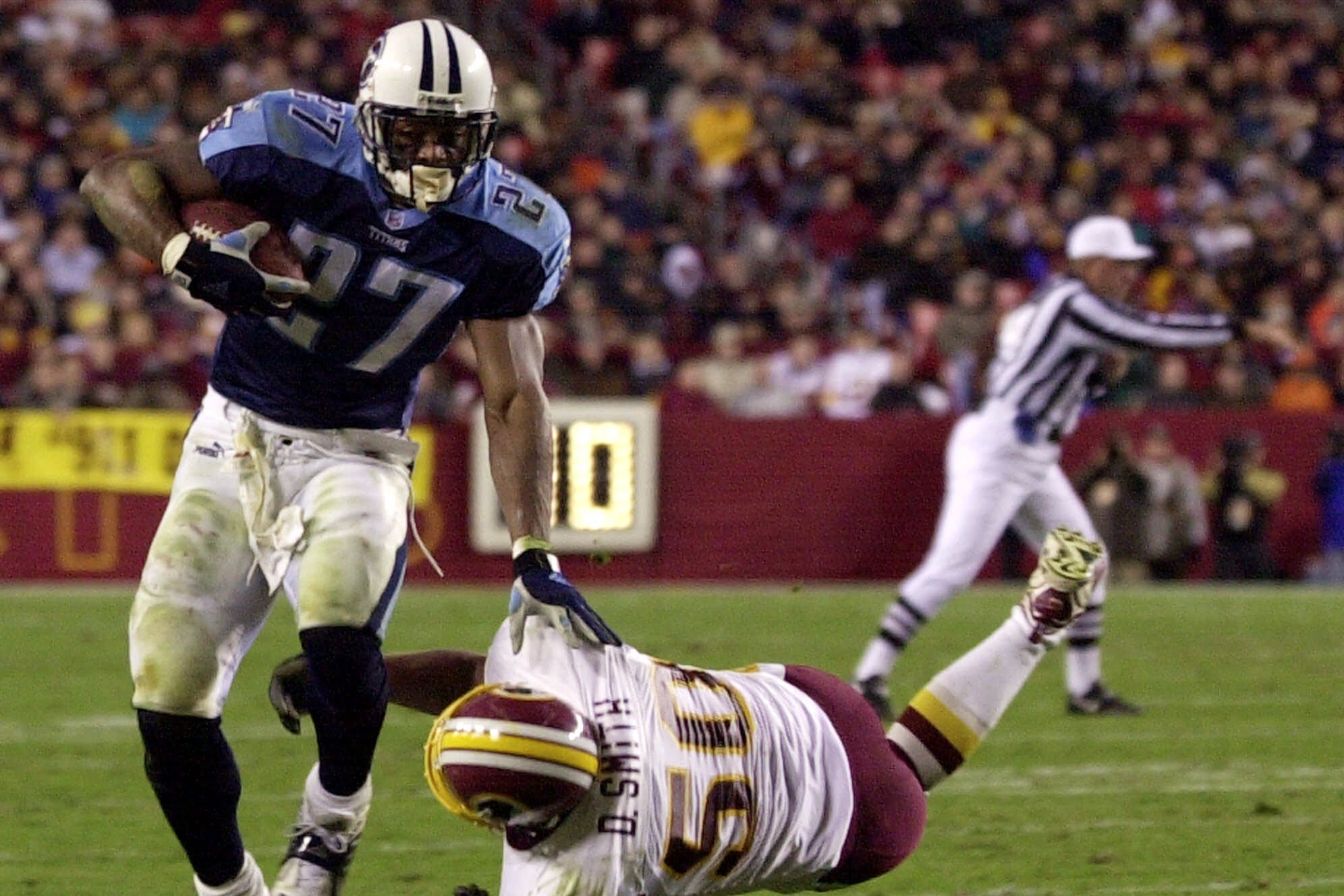 Tennessee Titans retiring former Ohio State football running back Eddie  George's No. 27 jersey 