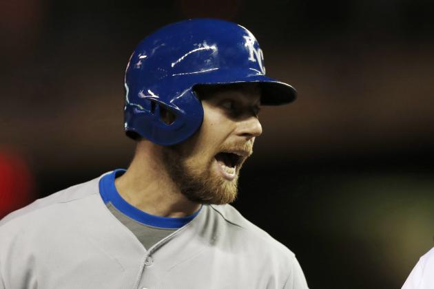 Kansas City Royals’ Ben Zobrist has some words for plate umpire Ron Kulpa after he was called out looking in the first inning of a baseball game, Friday, Oct. 2, 2015, in Minneapolis. (AP Photo/Jim Mone)