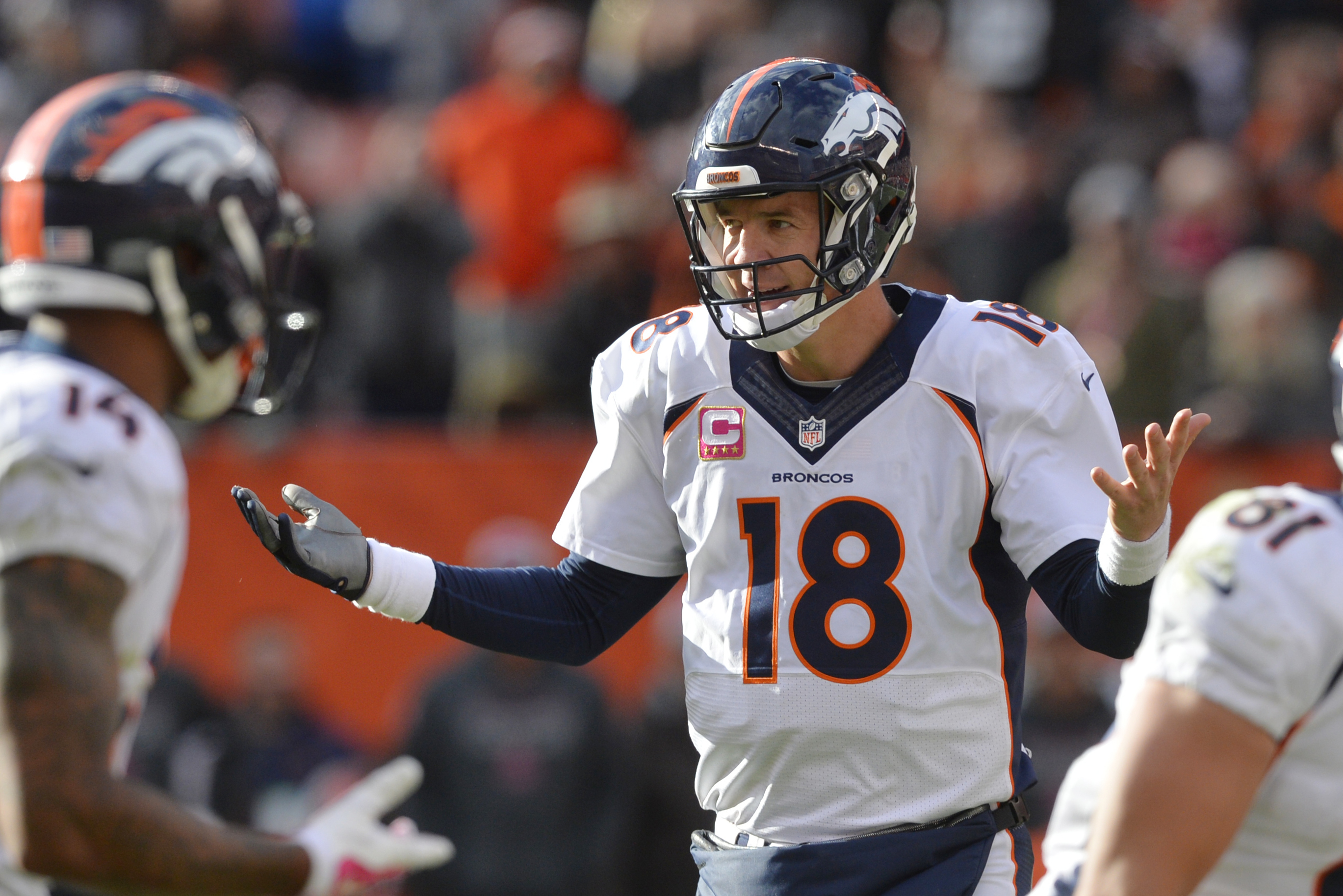 Denver Broncos QB Peyton Manning's son reaches for the Lombardi