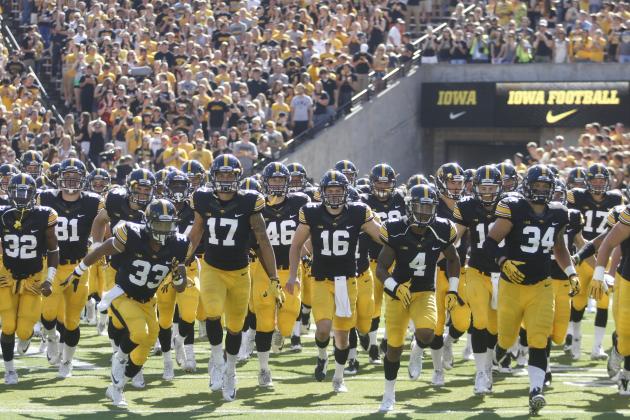 IOWA CITY, IA - SEPTEMBER 26:  Members of the Iowa Hawkeyes take the field before their match-up against the North Texas Mean Green on September 26, 2015 at Kinnick Stadium, in Iowa City, Iowa.  (Photo by Matthew Holst/Getty Images)