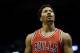 Chicago Bulls' Derrick Rose looks away during Game 4 of an NBA basketball first-round playoff series against the Milwaukee Bucks Saturday, April 25, 2015, in Milwaukee.