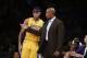 Los Angeles Lakers head coach Byron Scott, right, talks to D'Angelo Russell during the second half of an NBA preseason basketball game against the Portland Trail Blazers, Monday, Oct. 19, 2015, in Los Angeles. The Lakers won 104-102. (AP Photo/Jae C. Hong)