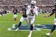 CHICAGO, IL - OCTOBER 04: Amari Cooper #89 of the Oakland Raiders scores a touchdown against the Chicago Bears in the second quarter at Soldier Field on October 4, 2015 in Chicago, Illinois. (Photo by David Banks/Getty Images)
