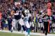 FOXBORO, MA - OCTOBER 29: Rob Gronkowski #87 of the New England Patriots carries the ball as he scores a touchdown during the first quarter against the Miami Dolphins at Gillette Stadium on October 29, 2015 in Foxboro, Massachusetts. (Photo by Jim Rogash/Getty Images)