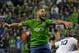 Seattle Sounders' Clint Dempsey reacts to a play in the second half of an MLS soccer western conference knockout round playoff match against the Los Angeles Galaxy, Wednesday, Oct. 28, 2015, in Seattle. The Sounders beat the Galaxy 3-2. (AP Photo/Ted S. Warren)