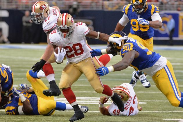 ST. LOUIS, MO - OCTOBER 13: Carlos Hyde #28 of the San Francisco 49ers rushes against the St. Louis Rams at the Edward Jones Dome on October 13, 2014 in St. Louis, Missouri.  (Photo by Michael B. Thomas/Getty Images)