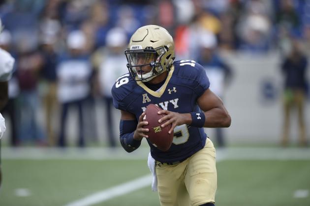 Navy quarterback Keenan Reynolds (19) during the first half of an NCAA football game against Tulane, Saturday, Oct. 24, 2015, in Annapolis, Md. (AP Photo/Nick Wass)