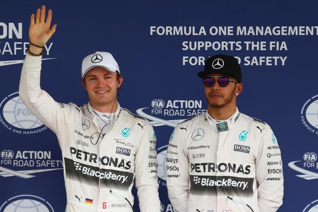 MEXICO CITY, MEXICO - OCTOBER 31:  Nico Rosberg of Germany and Mercedes GP celebrates pole position as team mate and second place driver Lewis Hamilton of Great Britain and Mercedes GP
looks on after qualifying for the Formula One Grand Prix of Mexico at Autodromo Hermanos Rodriguez on October 31, 2015 in Mexico City, Mexico.  (Photo by Clive Mason/Getty Images)