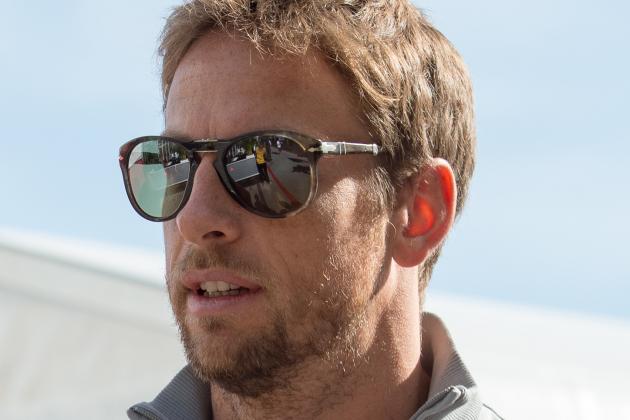 Nov 2, 2014; Austin, TX, USA; McLaren driver Jenson Button (22) of Great Britain enters the paddock prior to the 2014 U.S. Grand Prix at Circuit of the Americas. Mandatory Credit: Jerome Miron-USA TODAY Sports