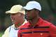 DUBLIN, OH - OCTOBER 05: Tiger Woods of the U.S. Team waits near International Team caddie Steve Williams on the 13th hole during the Day Three Four-ball Matches at the Muirfield Village Golf Club on October 5, 2013 in Dublin, Ohio. (Photo by Andy Lyons/Getty Images)