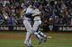 Kansas City Royals pitcher Wade Davis (17) celebrates with Drew Butera\after Game 5 of the Major League Baseball World Series against the New York Mets Monday, Nov. 2, 2015, in New York. The Royals won 7-2 to win the series. (AP Photo/Matt Slocum)