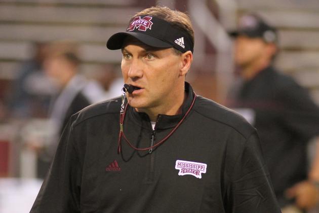 Mississippi State coach Dan Mullen watches his team warm up before their NCAA college football game against Kentucky in Starkville, Miss., Saturday, Oct. 24, 2015. (AP Photo/Jim Lytle)