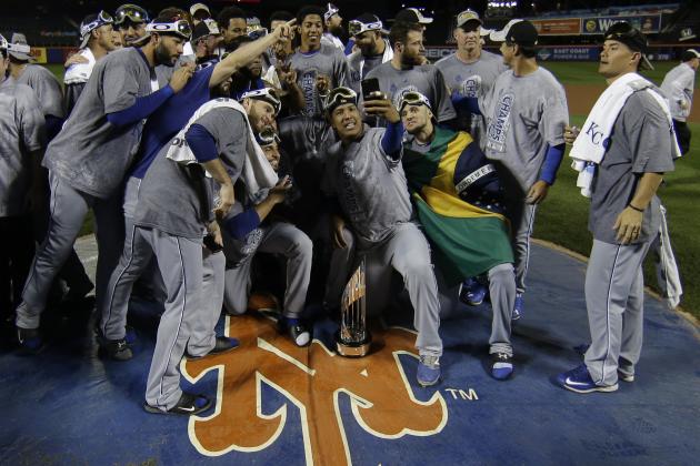 Kansas City Royals pose with World Series trophy after Game 5 of the Major League Baseball World Series against the New York Mets Monday, Nov. 2, 2015, in New York. The Royals won 7-2 to win the series. (AP Photo/Matt Slocum)