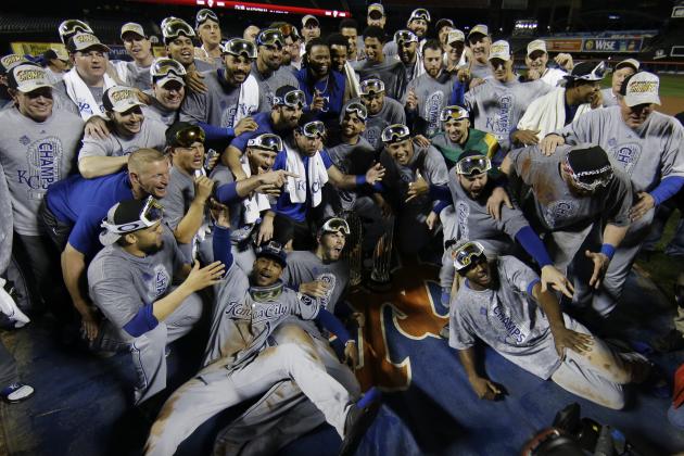 Kansas City Royals pose with World Series trophy after Game 5 of the Major League Baseball World Series against the New York Mets Monday, Nov. 2, 2015, in New York. The Royals won 7-2 to win the series. (AP Photo/Matt Slocum)
