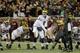 Michigan quarterback Wilton Speight (3) plays during an NCAA college football game against Minnesota, Saturday, Oct. 31, 2015 in Minneapolis. (AP Photo/Paul Battaglia)