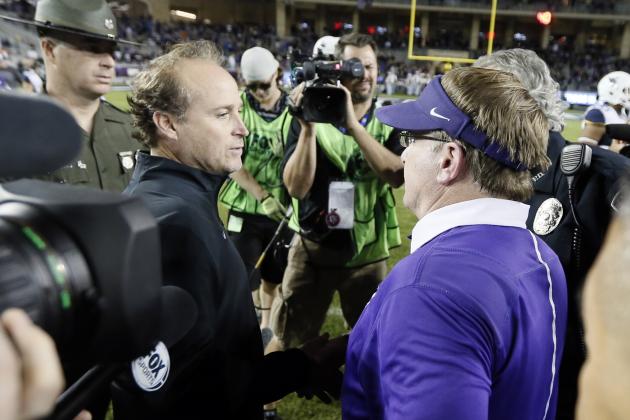 West Virginia head coach Dana Holgorsen, left, and TCU head coach Gary Patterson, right, talk on the field after their NCAA college football game Thursday, Oct. 29, 2015, in Fort Worth, Texas. (AP Photo/Tony Gutierrez)