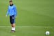 Real Madrid's Portuguese forward Cristiano Ronaldo looks at the ball during a training session at Valdebebas sport city in Madrid on November 2, 2015 on the eve of their Champions' League football match against Paris Saint Germain. AFP PHOTO/ PIERRE-PHILIPPE MARCOU (Photo credit should read PIERRE-PHILIPPE MARCOU/AFP/Getty Images)