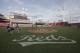 Workers prepare the field at Great American Ballpark for a baseball game between the Cincinnati Reds and the Atlanta Braves, Tuesday, May 12, 2015, in Cincinnati. (AP Photo/John Minchillo)