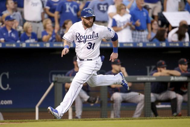 Kansas City Royals' Jonny Gomes runs home after hitting a solo home run during the second inning of a baseball game against the Detroit Tigers Wednesday, Sept. 2, 2015, in Kansas City, Mo. (AP Photo/Charlie Riedel)