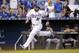 Kansas City Royals' Jonny Gomes runs home after hitting a solo home run during the second inning of a baseball game against the Detroit Tigers Wednesday, Sept. 2, 2015, in Kansas City, Mo. (AP Photo/Charlie Riedel)