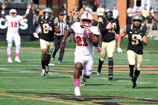 WINSTON-SALEM, NC - OCTOBER 24: Matthew Dayes #21 of the North Carolina State Wolfpack runs for a 57-yard touchdown against the Wake Forest Demon Deacons at BB&T Field on October 24, 2015 in Winston-Salem, North Carolina. NC State defeated Wake Forest 35-17. (Photo by Lance King/Getty Images)
