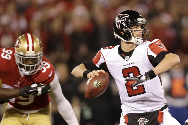Atlanta Falcons quarterback Matt Ryan (2) passes as San Francisco 49ers linebacker Aldon Smith (99) applies pressure during the first quarter of an NFL football game in San Francisco, Monday, Dec. 23, 2013. (AP Photo/Marcio Jose Sanchez)